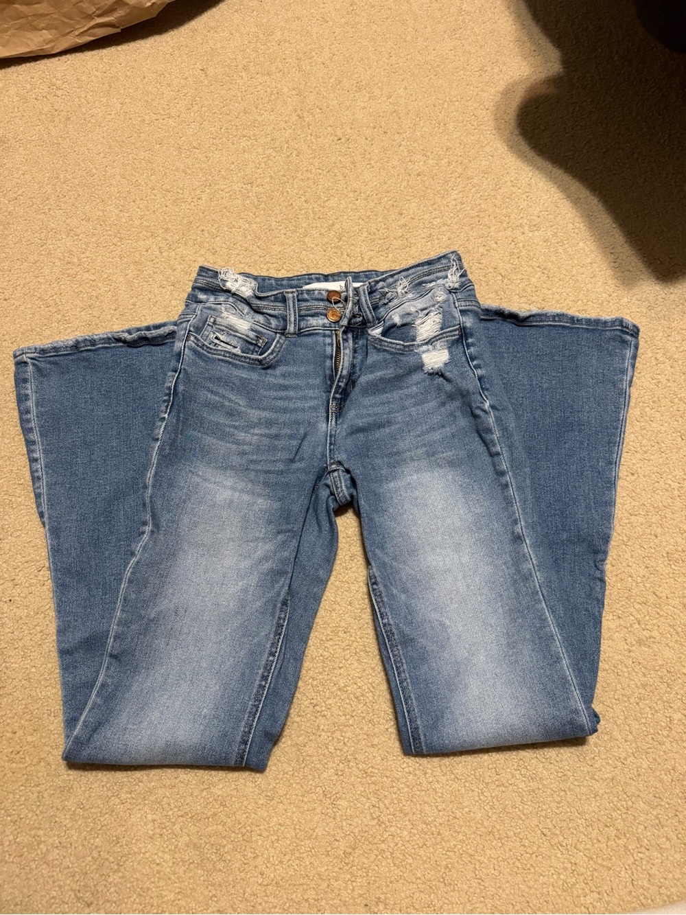Women's Light Wash Flare Jeans with Distressed Detail